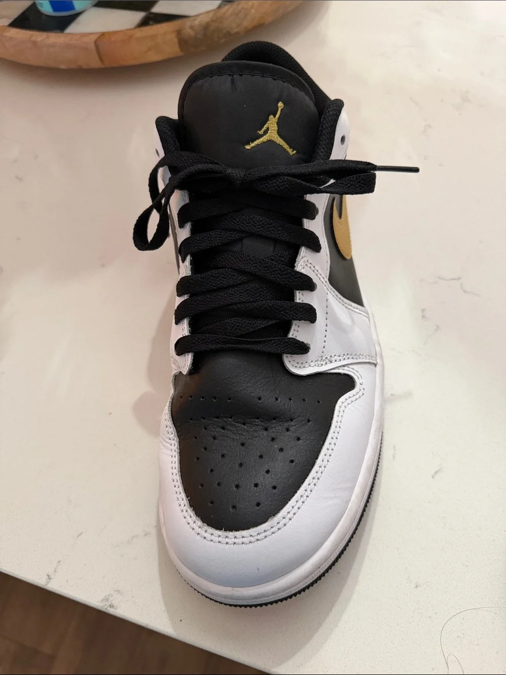Jordan Low Top Sneakers in Black & Gold